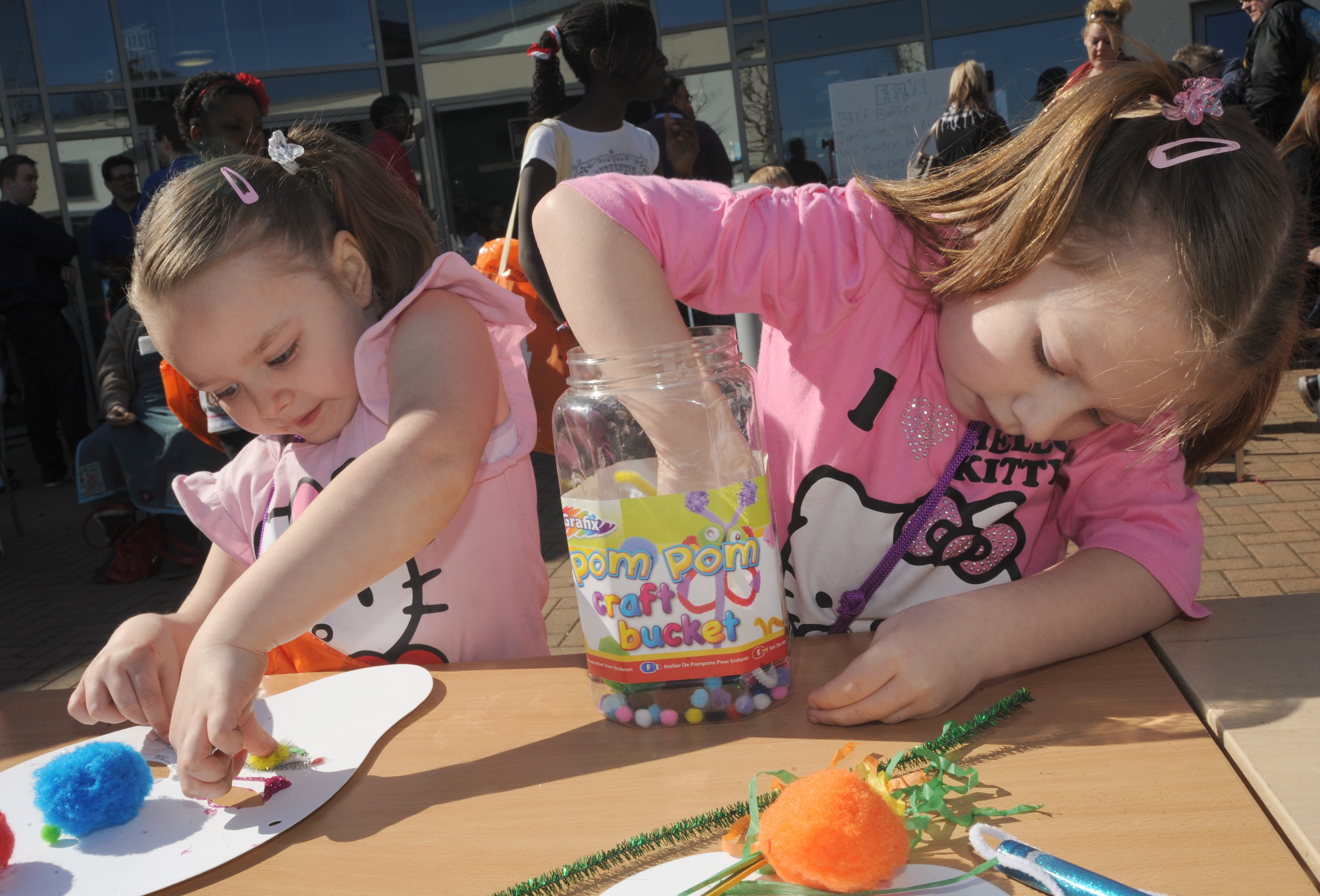 Two little girls doing craftwork